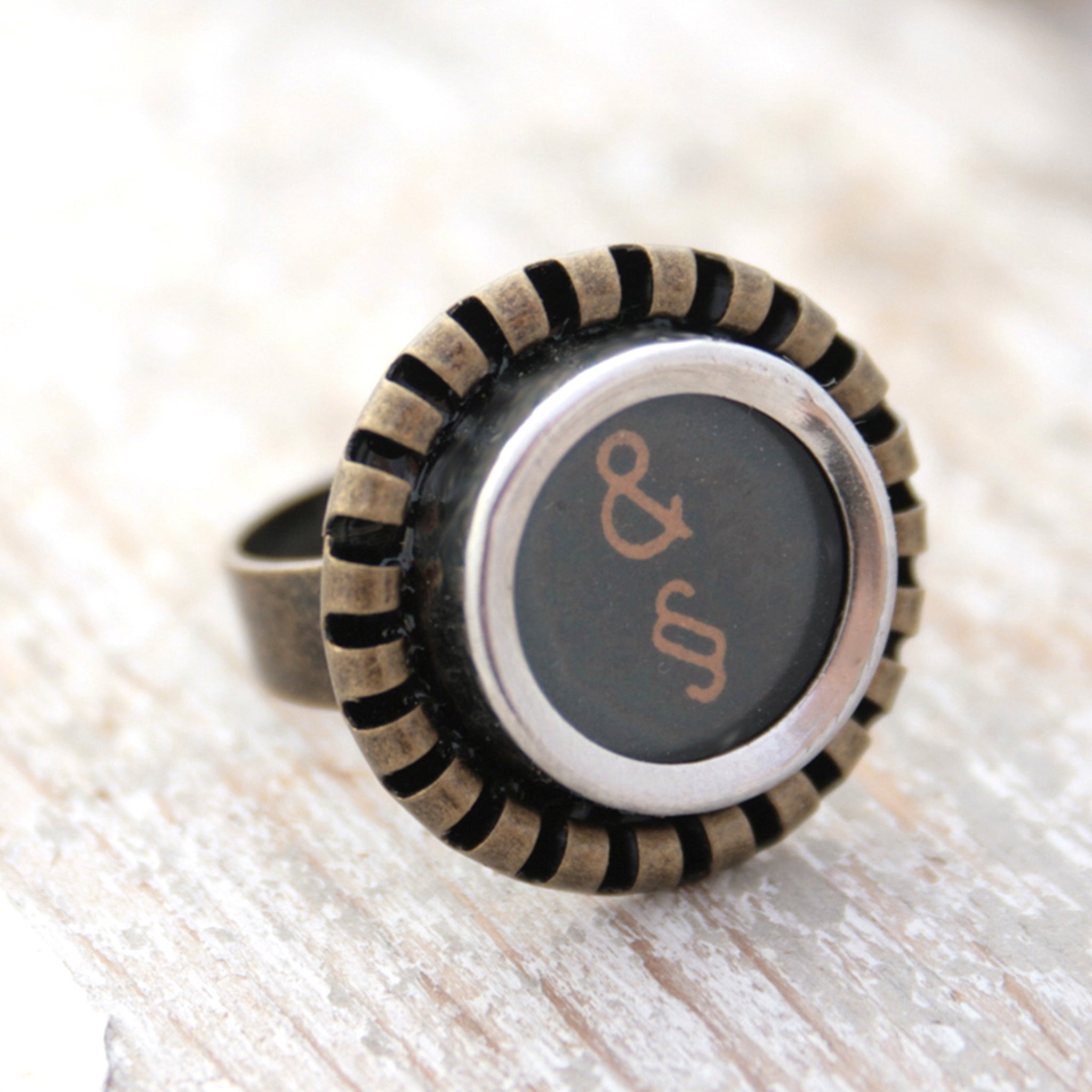 Black Ring featuring Amresand and paragraph signs made of typewriter key