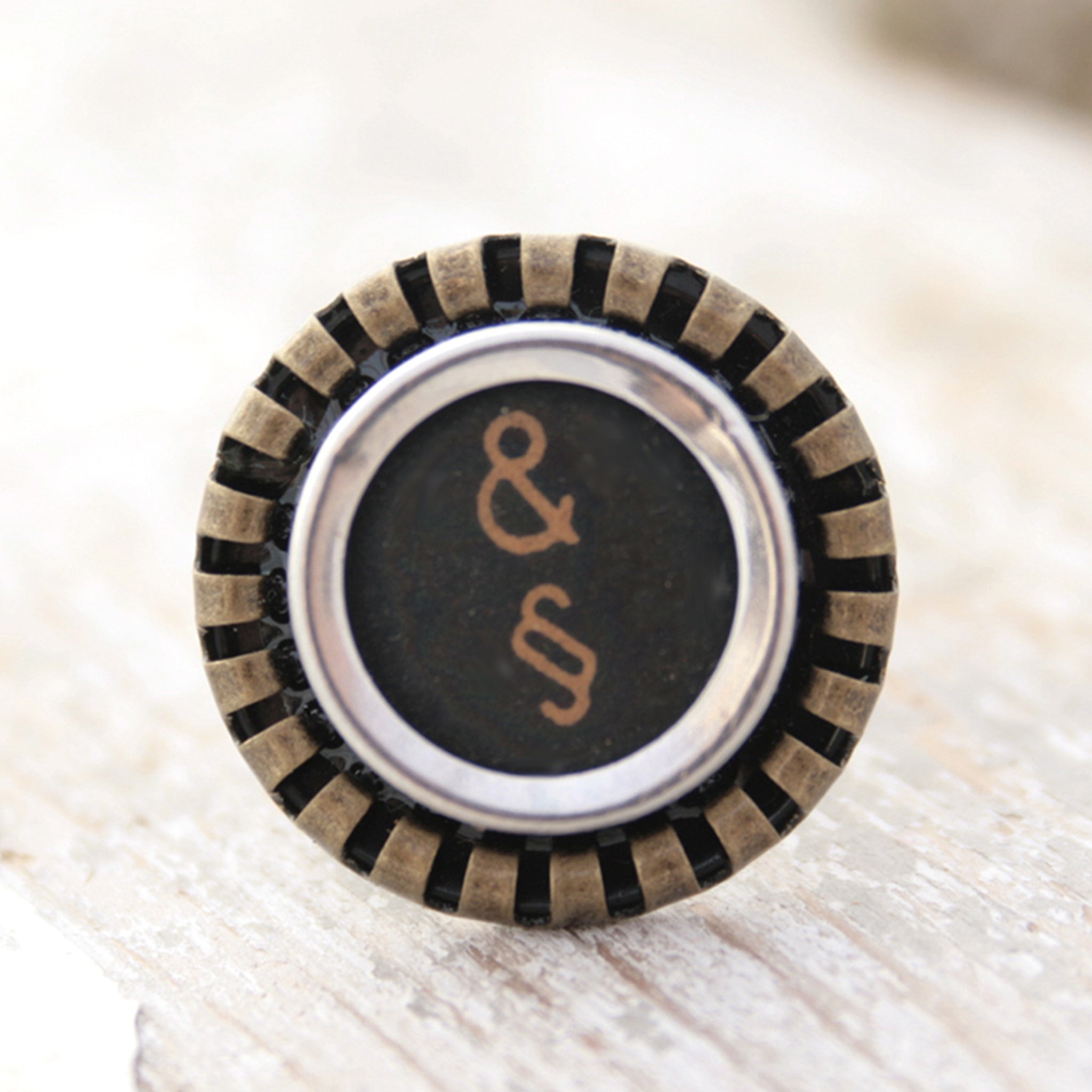 Black Ring featuring Amresand and paragraph signs made of typewriter key