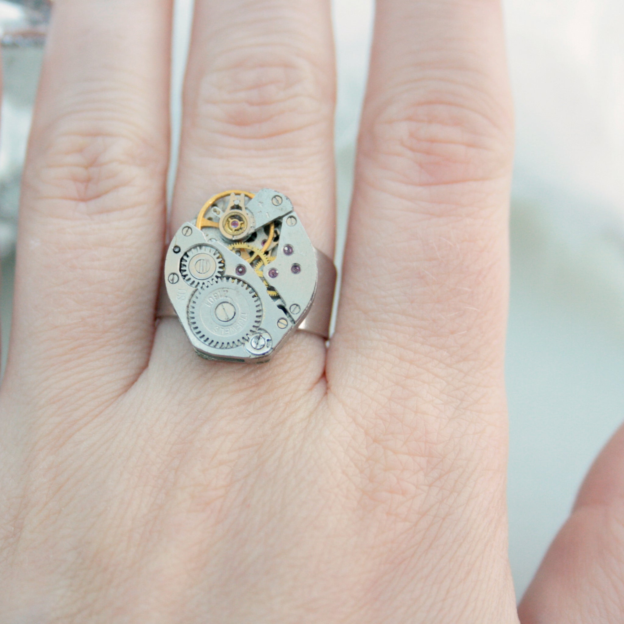 Steampunk Signet Ring made of real watch on a hand