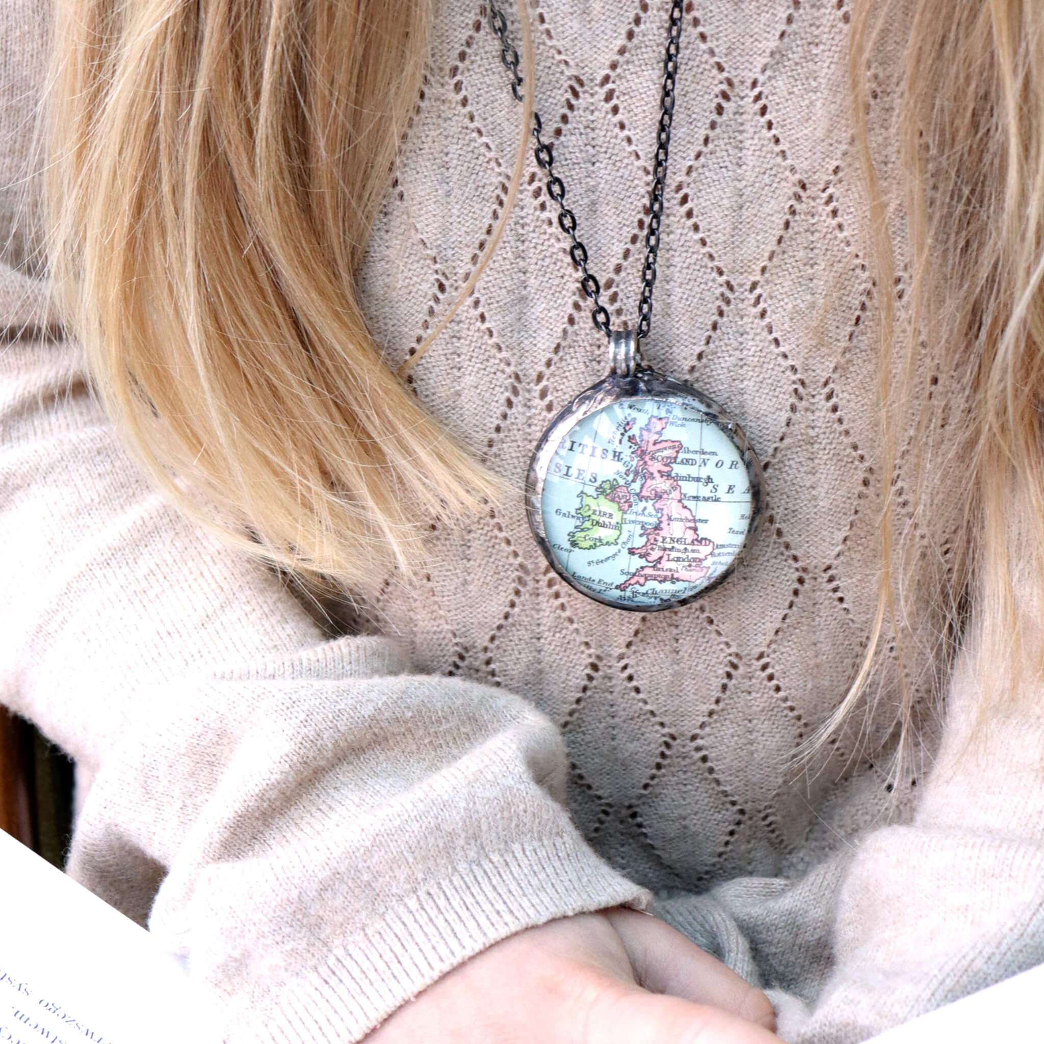 Girl wearing Tiffany style statement necklace featuring map of British Isles 