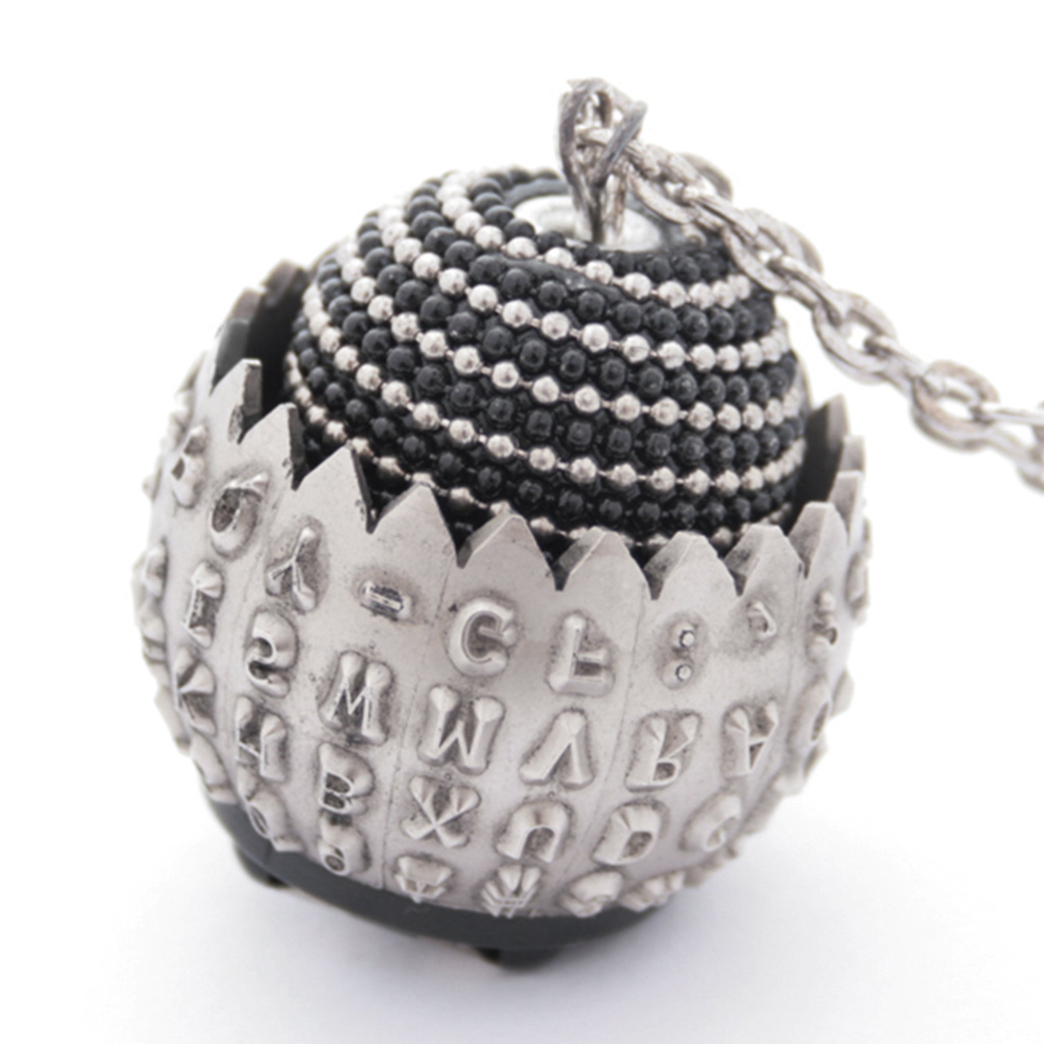 IBM Selectric typewriter font ball with large metal bead turned into eye catching necklace