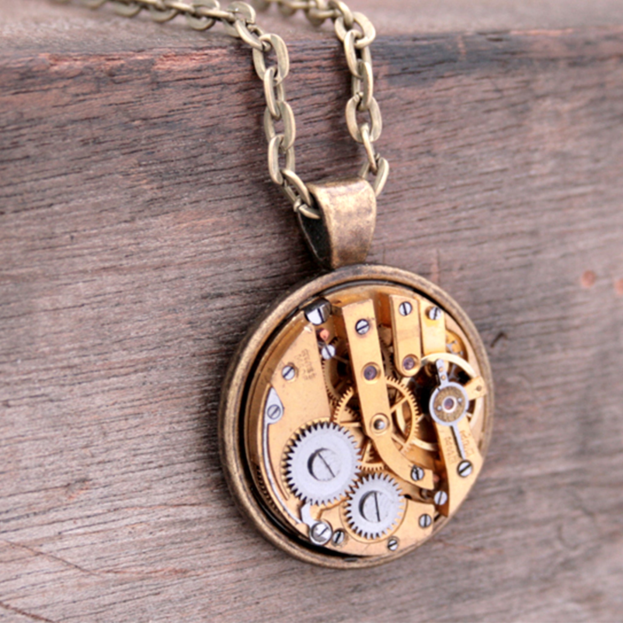 Steampunk Necklace in Gold Tone with gold watch movement