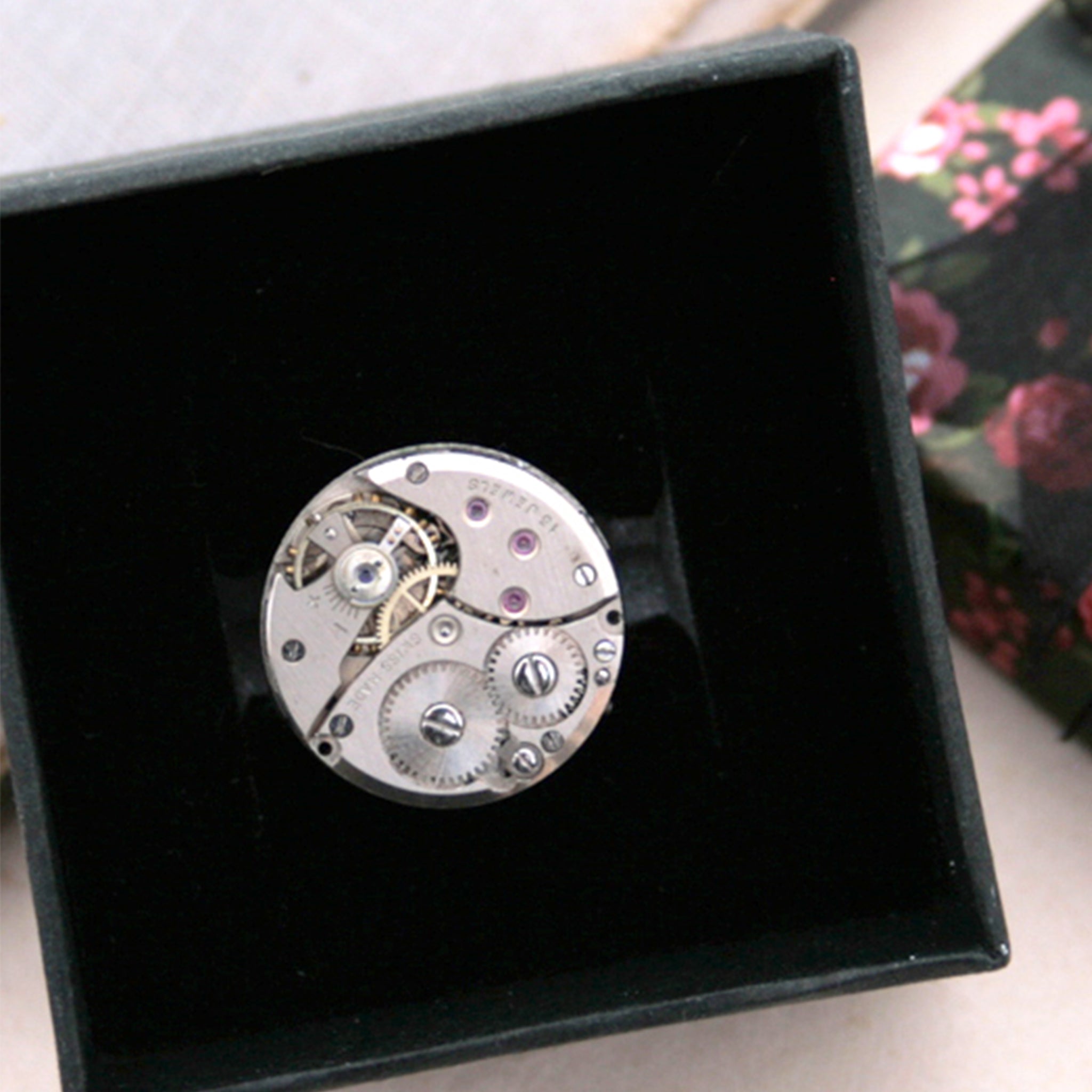 steampunk ring made of a real Swiss watch mechanism in a box