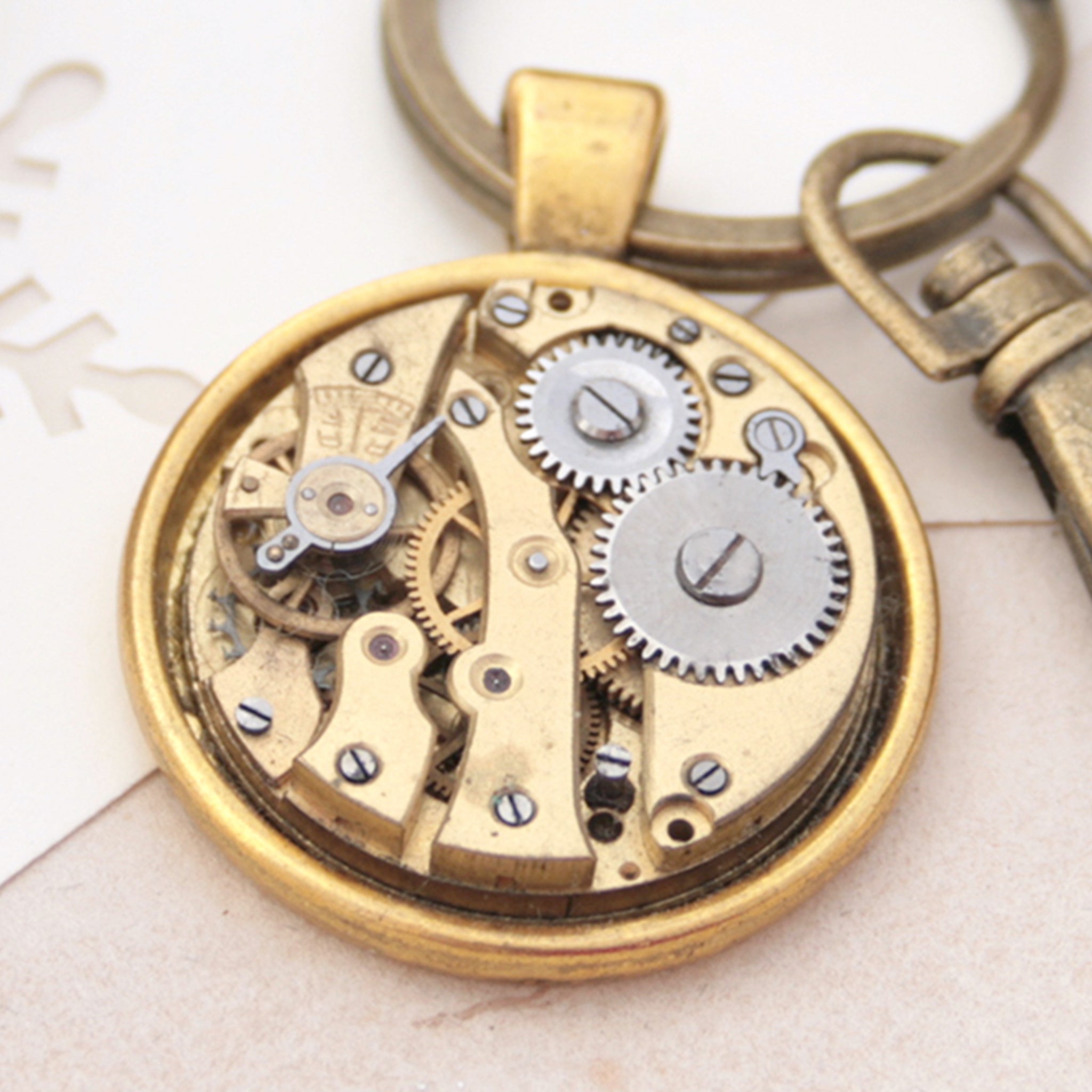 Keyrings for Car Keys made of gold tone watch movement