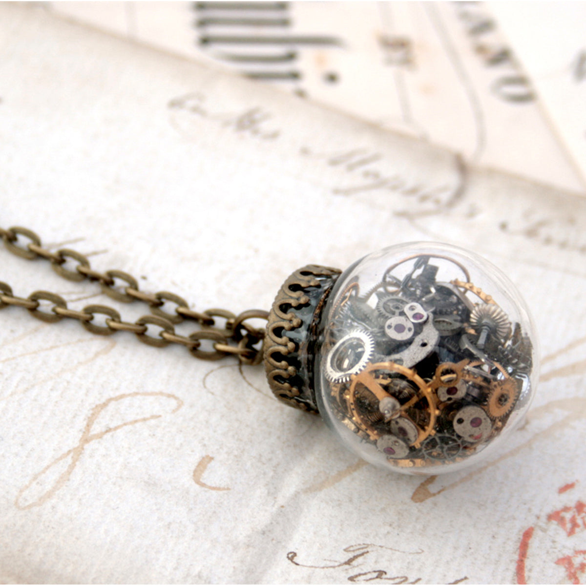 Home / Products / Terrarium Necklace with Watch Parts