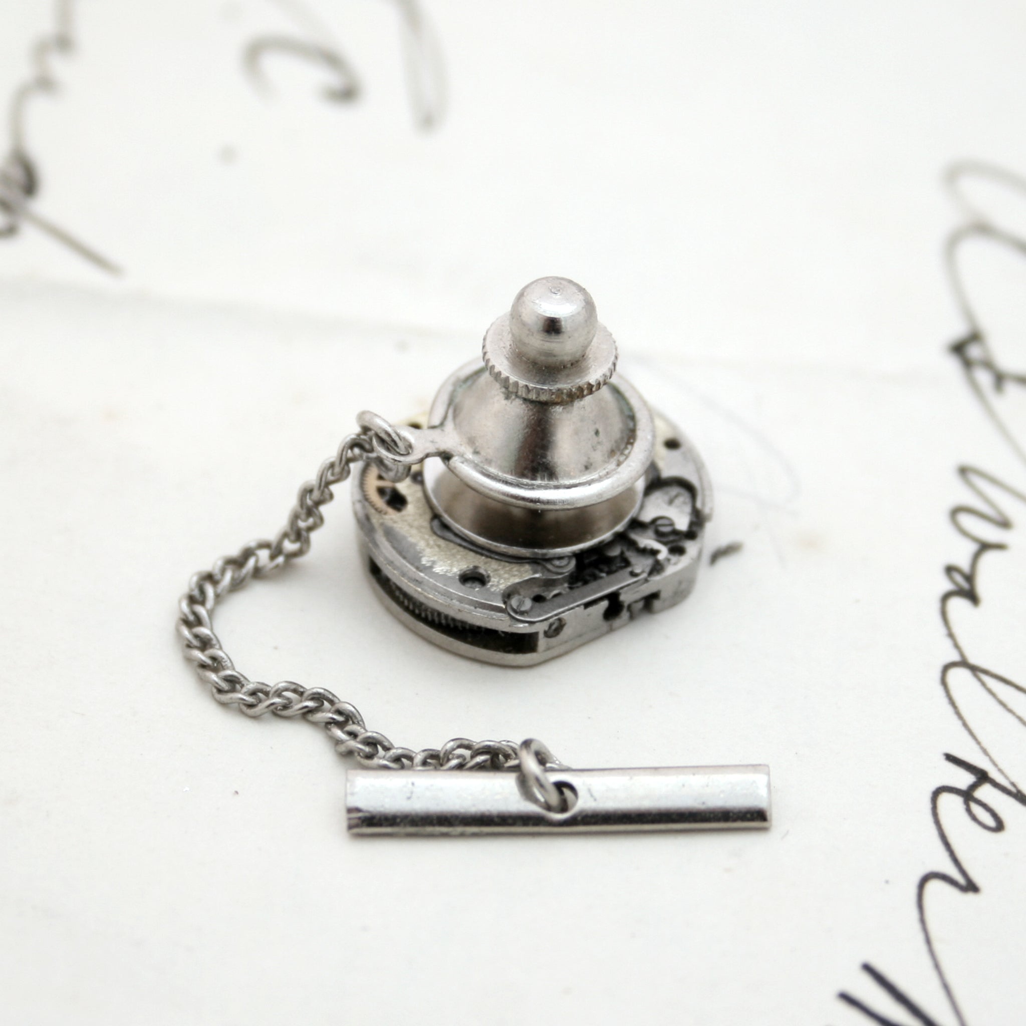 Back of the Steampunk Tie Tack with chain