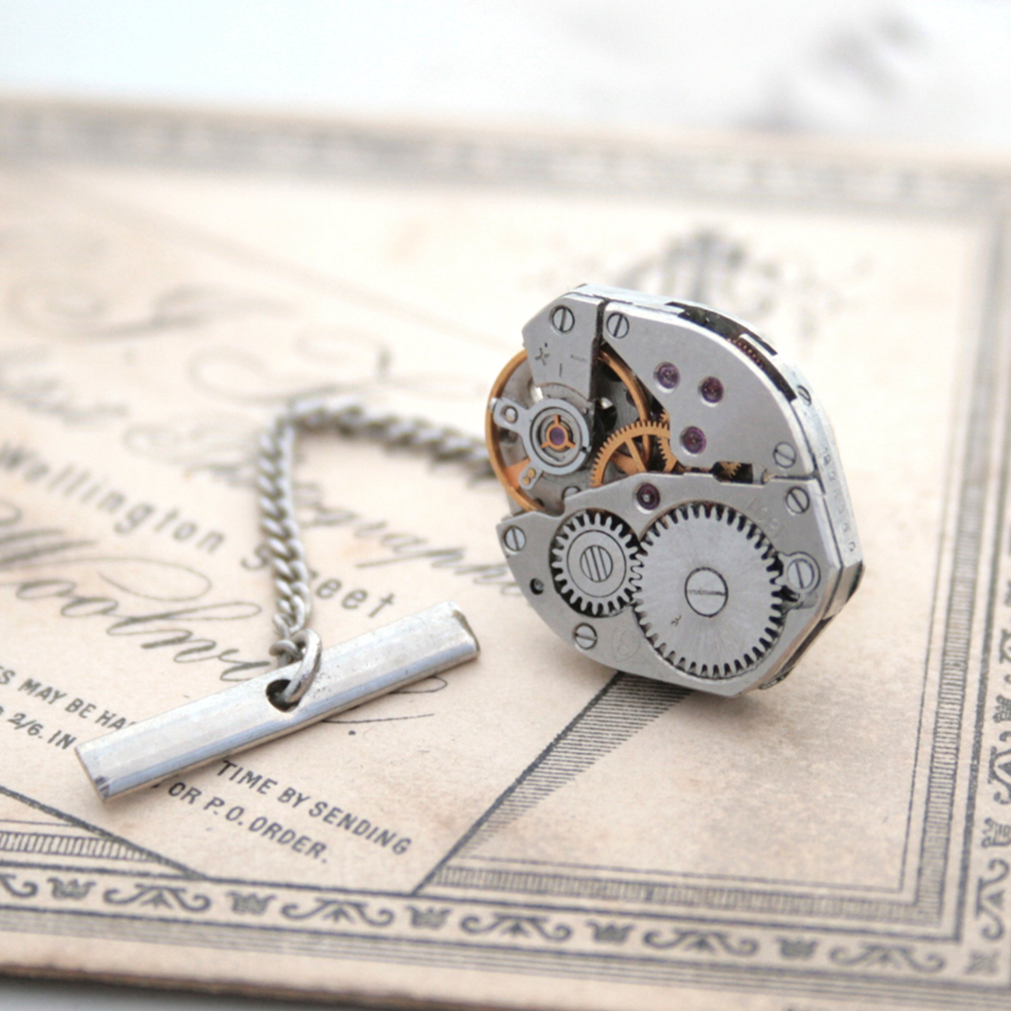 Steam punk tie tack with chain made of real watch