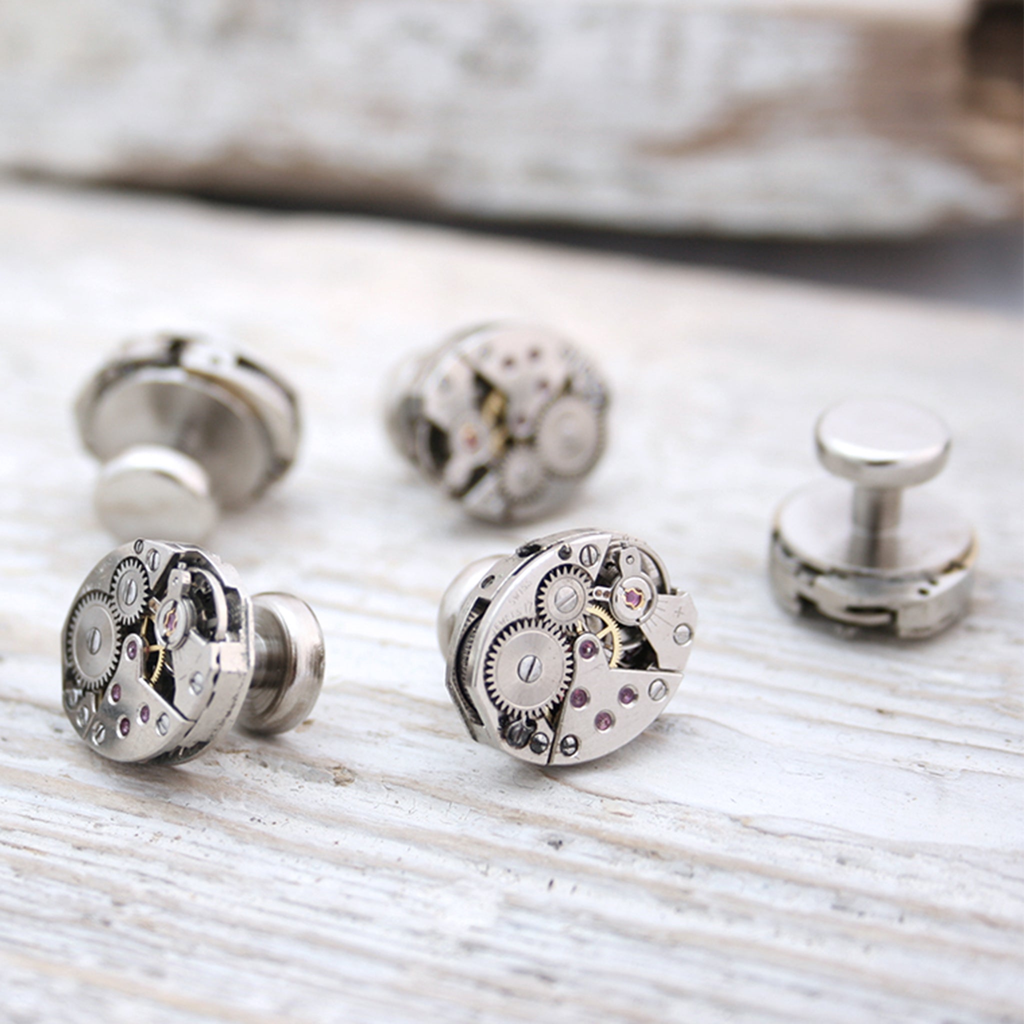 Set of four tuxedo studs made of real watch mechanisms