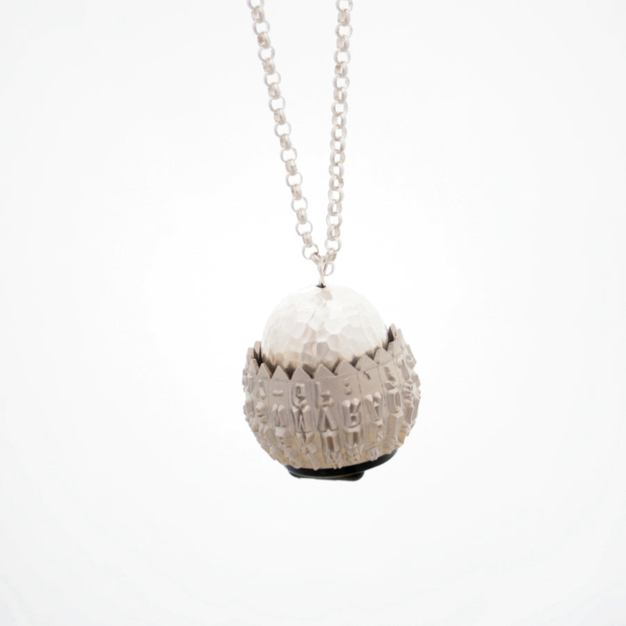 IBM Selectric typeball with sterling silver bead turned into quirky necklace