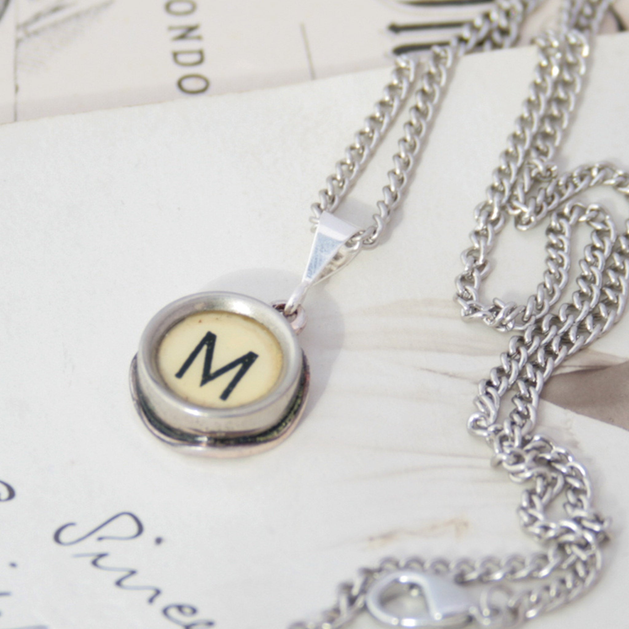 M letter necklace in ivory color made of vintage typewriter key