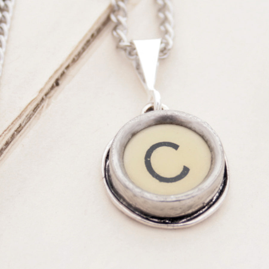 M letter necklace in ivory color made of vintage typewriter key