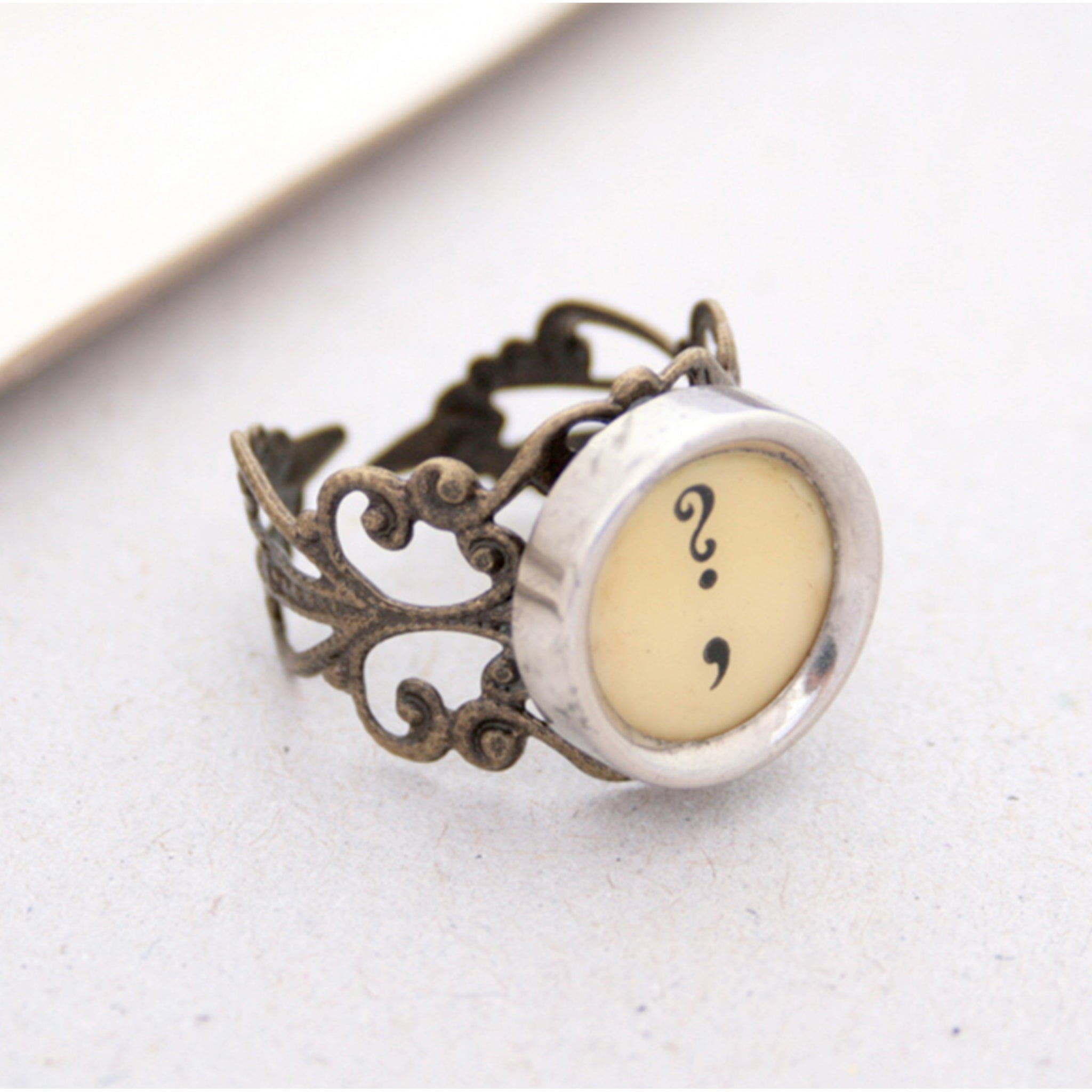 Ring with question mark and comma made of  typewriter key in ivory color