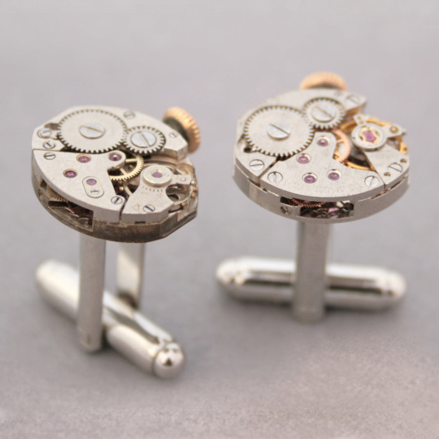steampunk wedding cufflinks featuring antique watch movements with wind ups