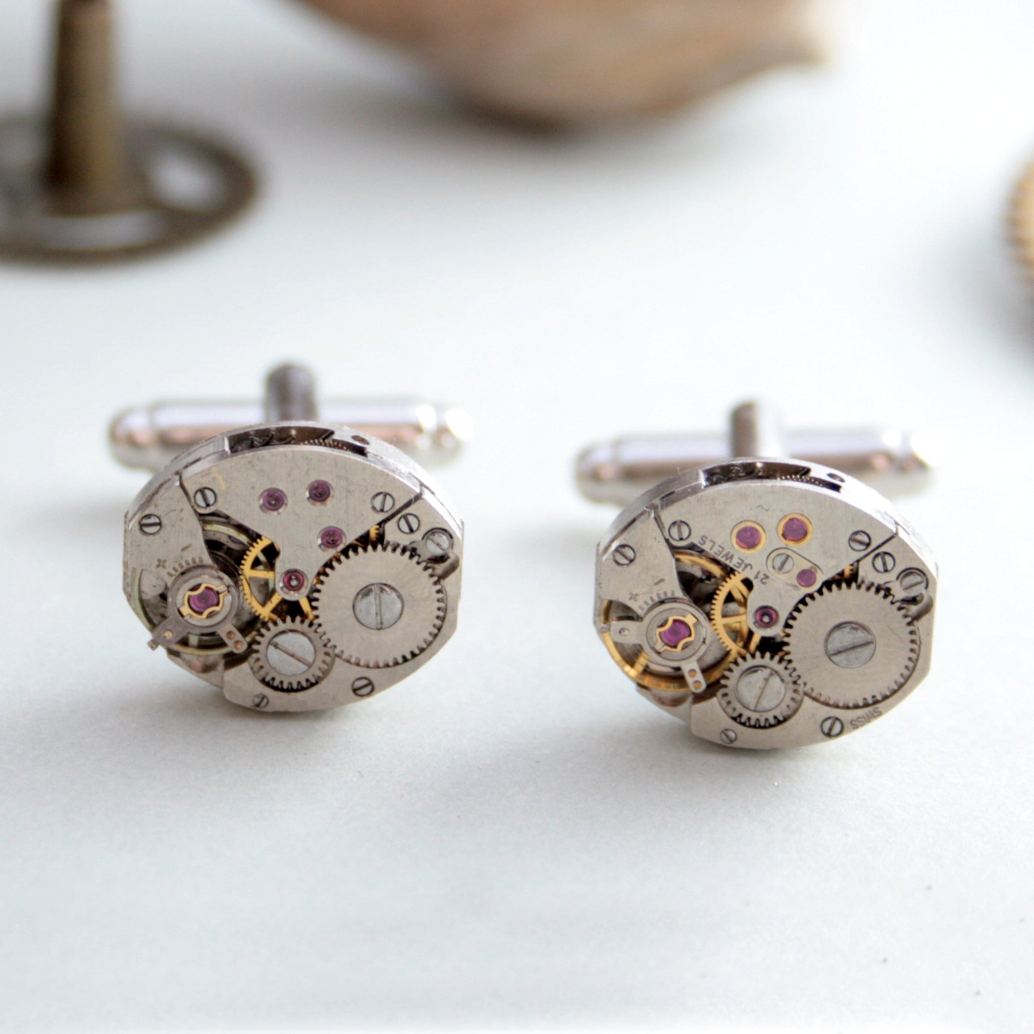 steampunk womens cufflinks featuring antique watch movements