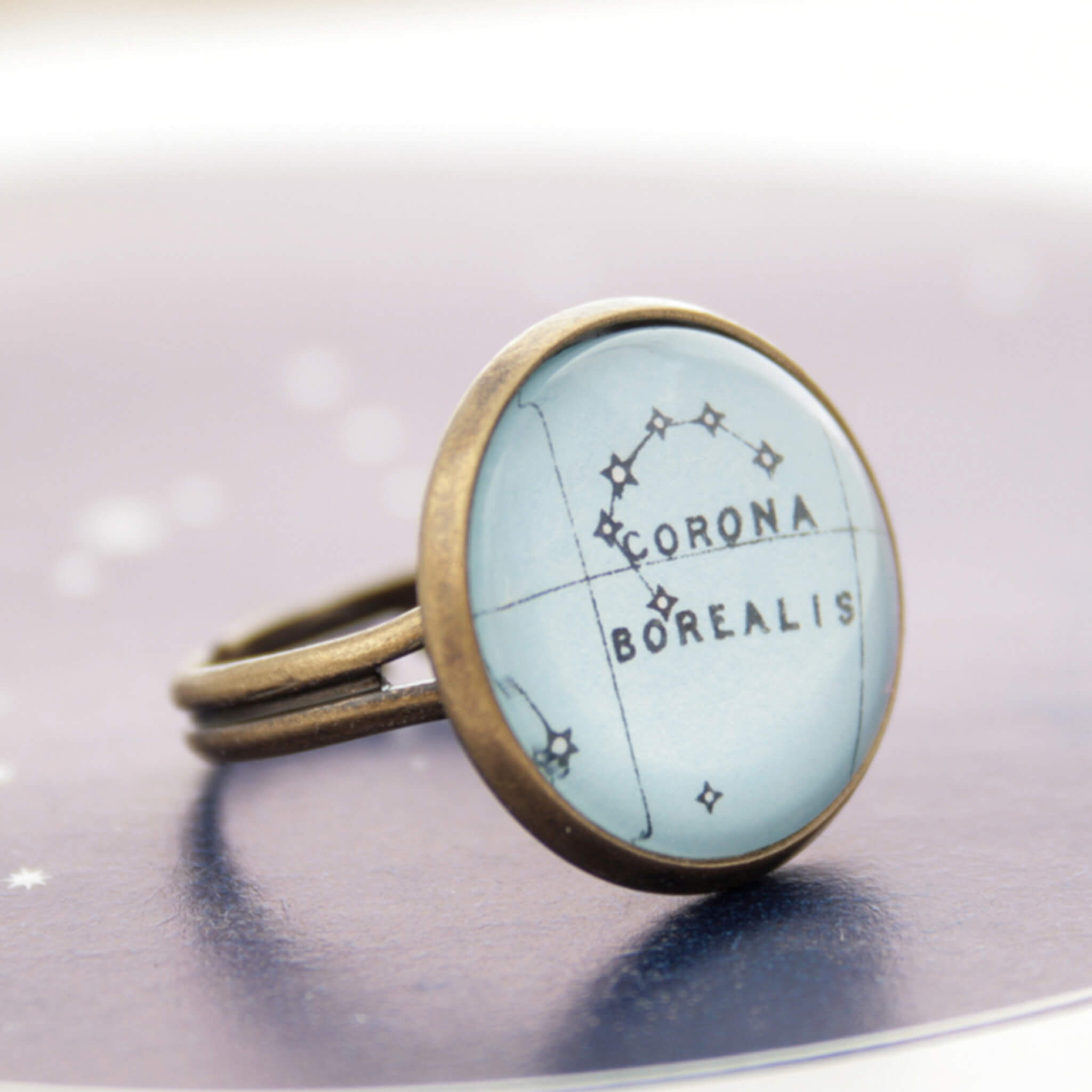 Bronze ring featuring map of heaven with Corona Borealis