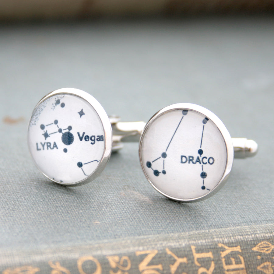 White cufflinks on silver blanks featuring Lyra and Draco star constellations
