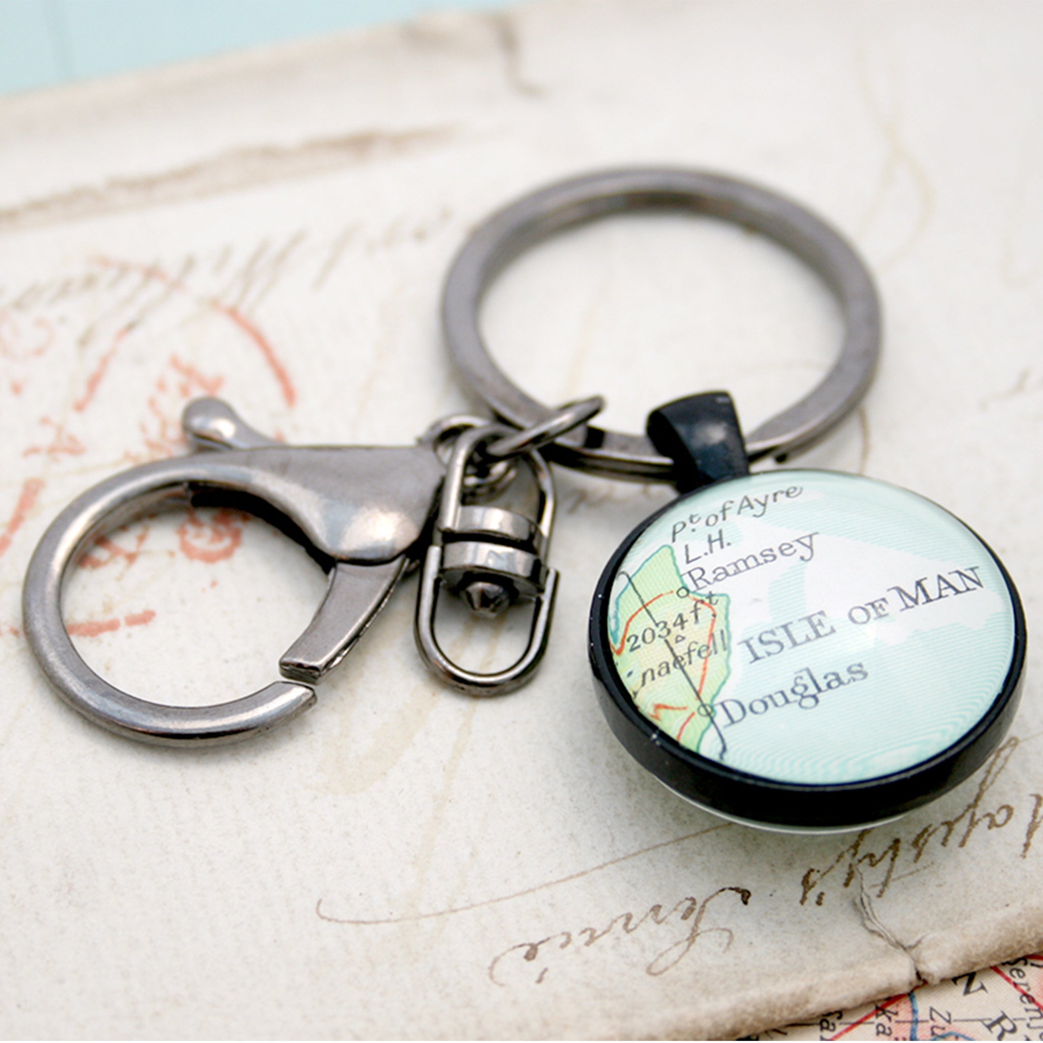 Personalised Keyring in black color featuring map of Isle of Man