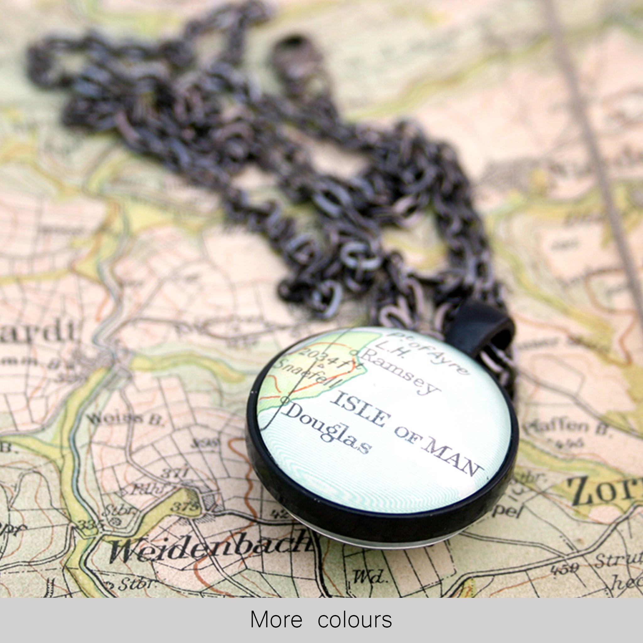 Black double sided pendant necklace featuring map of Isle of Man