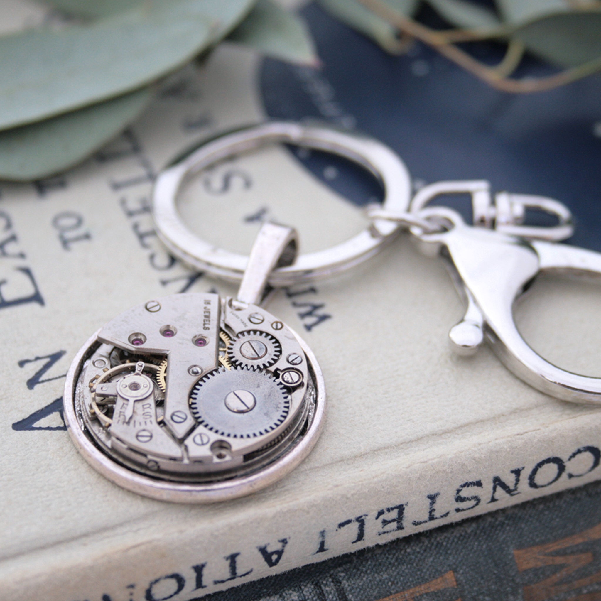 Very manly, steampunk keychain, made of real antique watch movement on metal base in silver tone