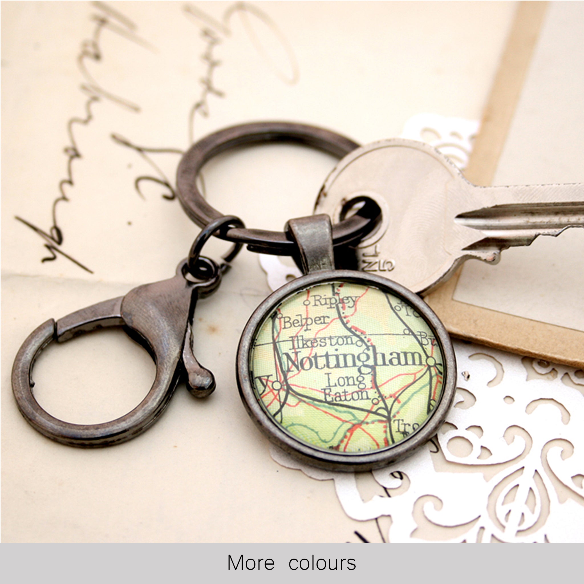 Personalised keyring in gunmetal black color featuring map of Nottingham