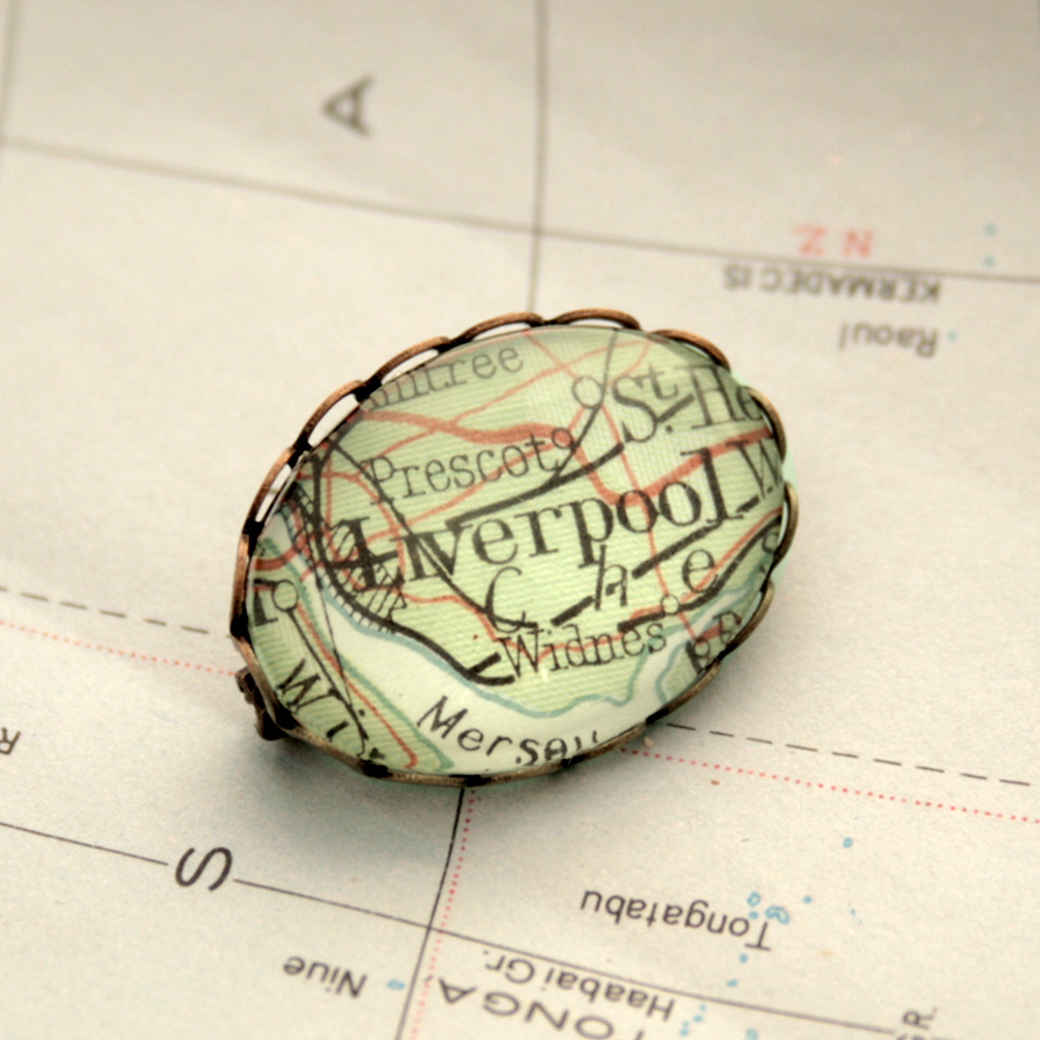Antique Bronze brooch featuring map of Liverpool