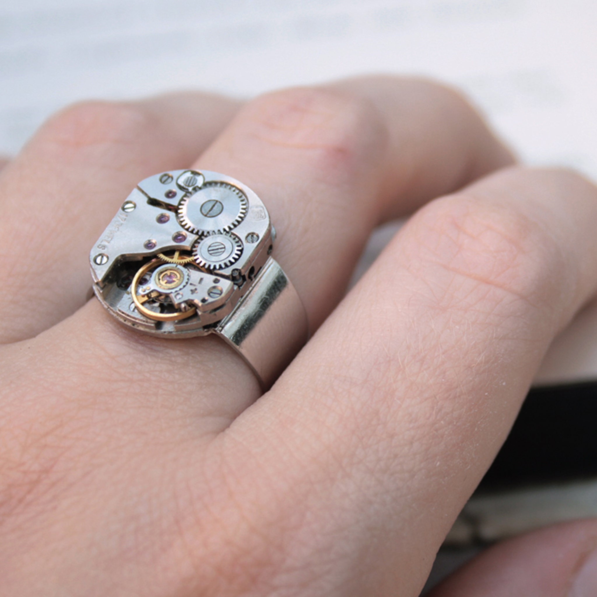 Mens Pinky Ring in Steampunk Style made of watch mechanism worn on hand