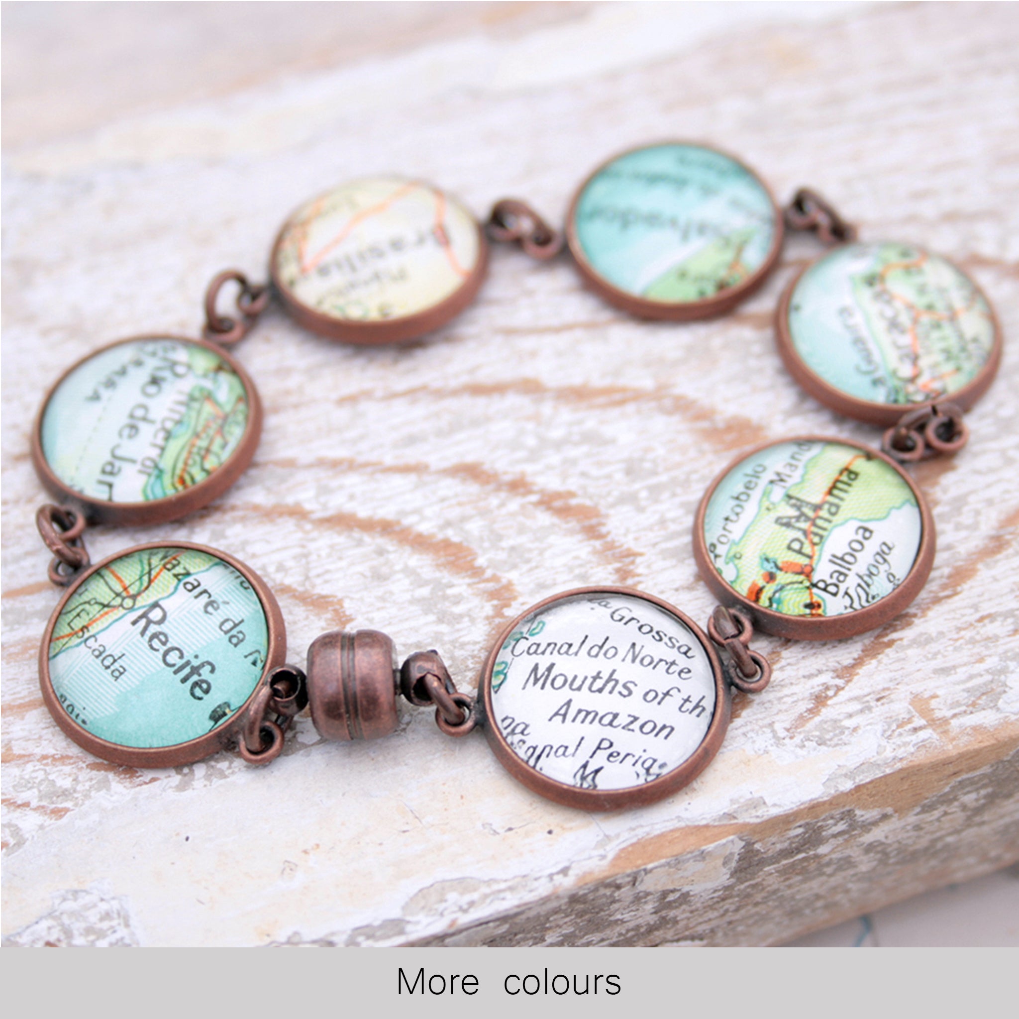 Antique copper beaded bracelet featuring different map locations