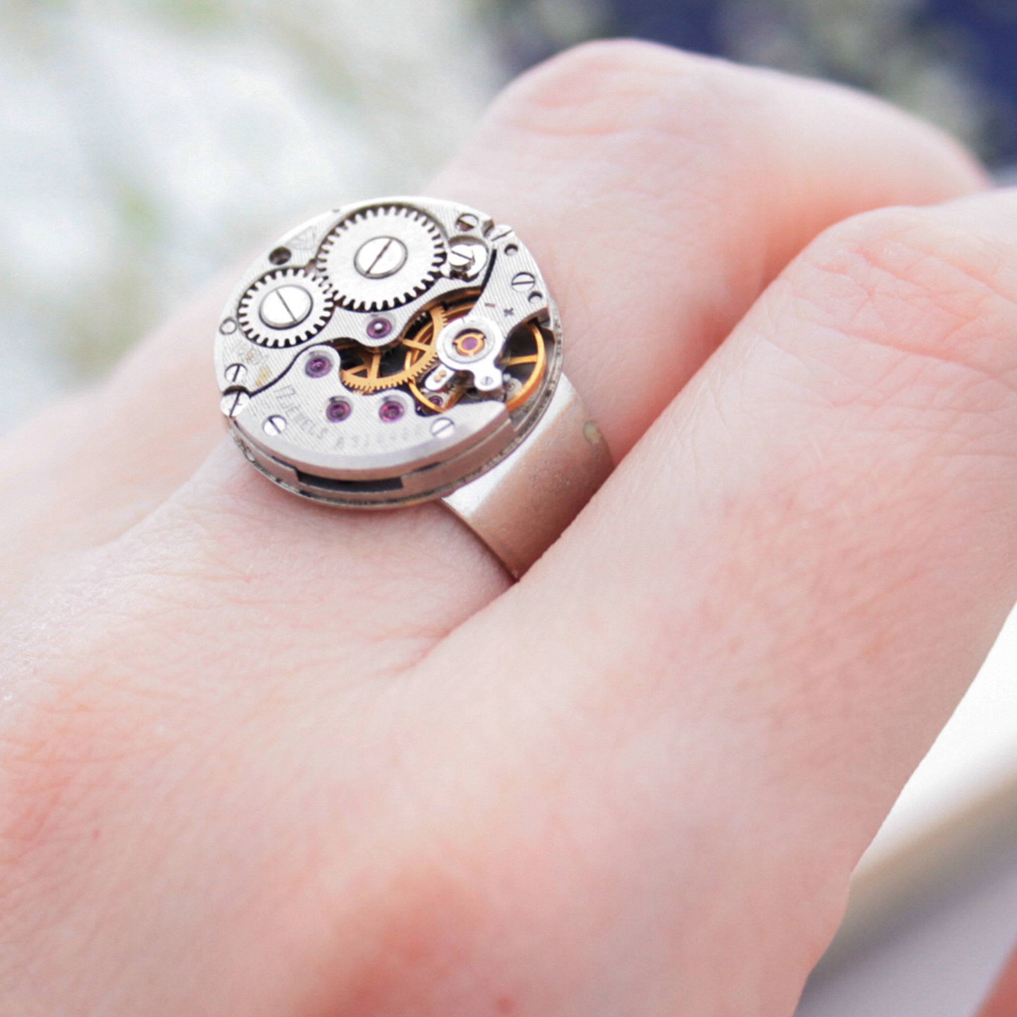 Round Steampunk Mens Signet Ring made of watch inside on hand