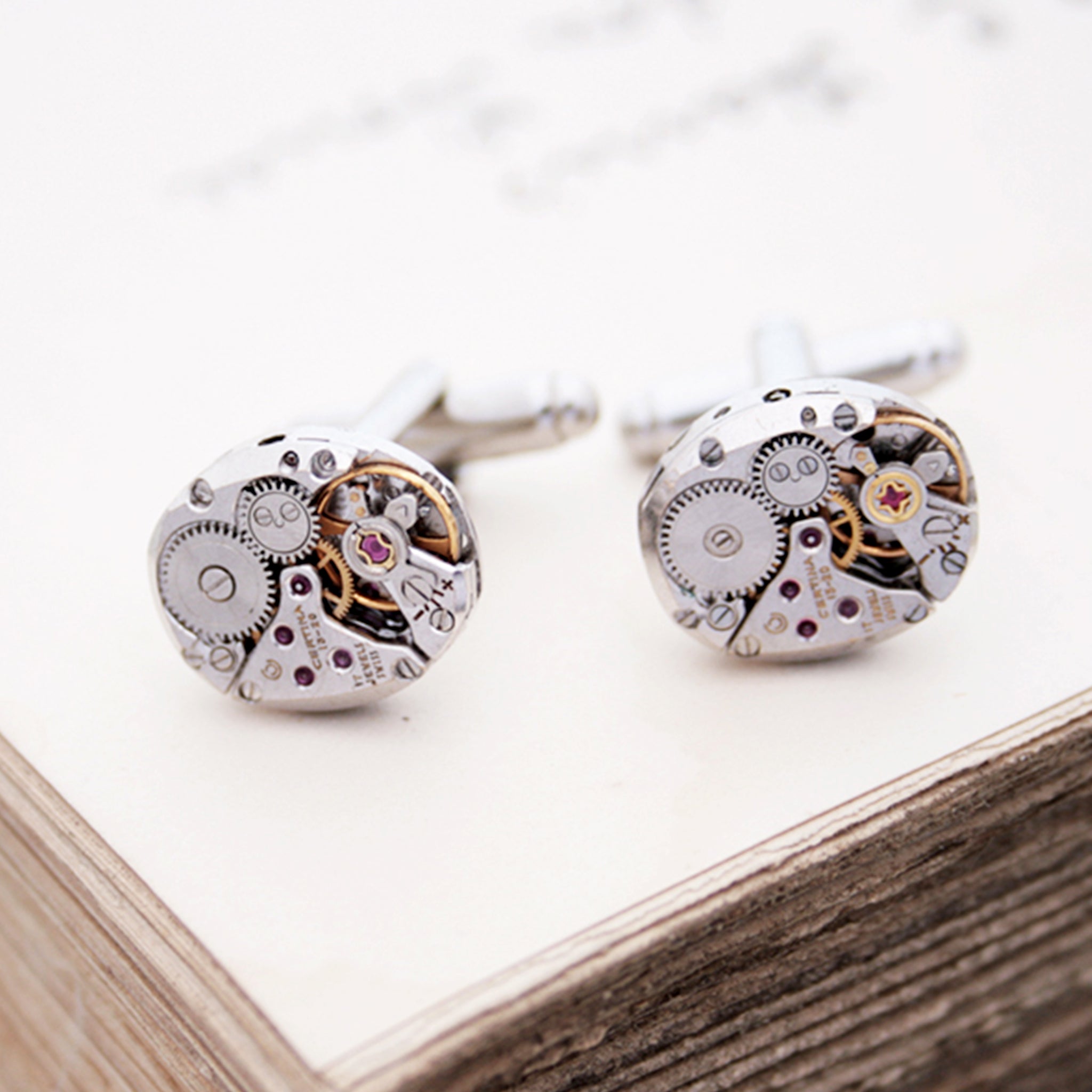 sterling cufflinks made of antique Certina watch movements