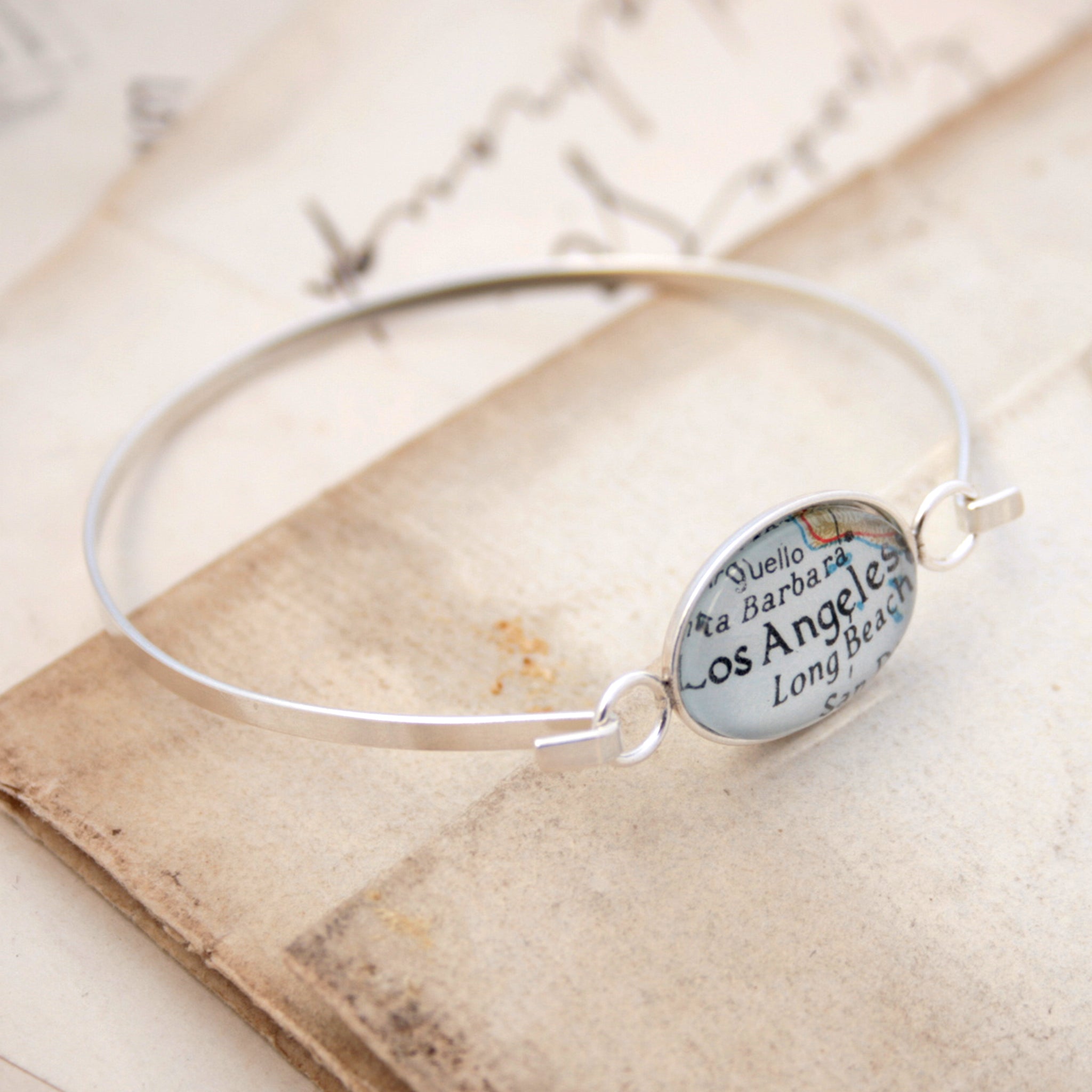 Sterling silver bangle bracelet featuring map of Los Angeles