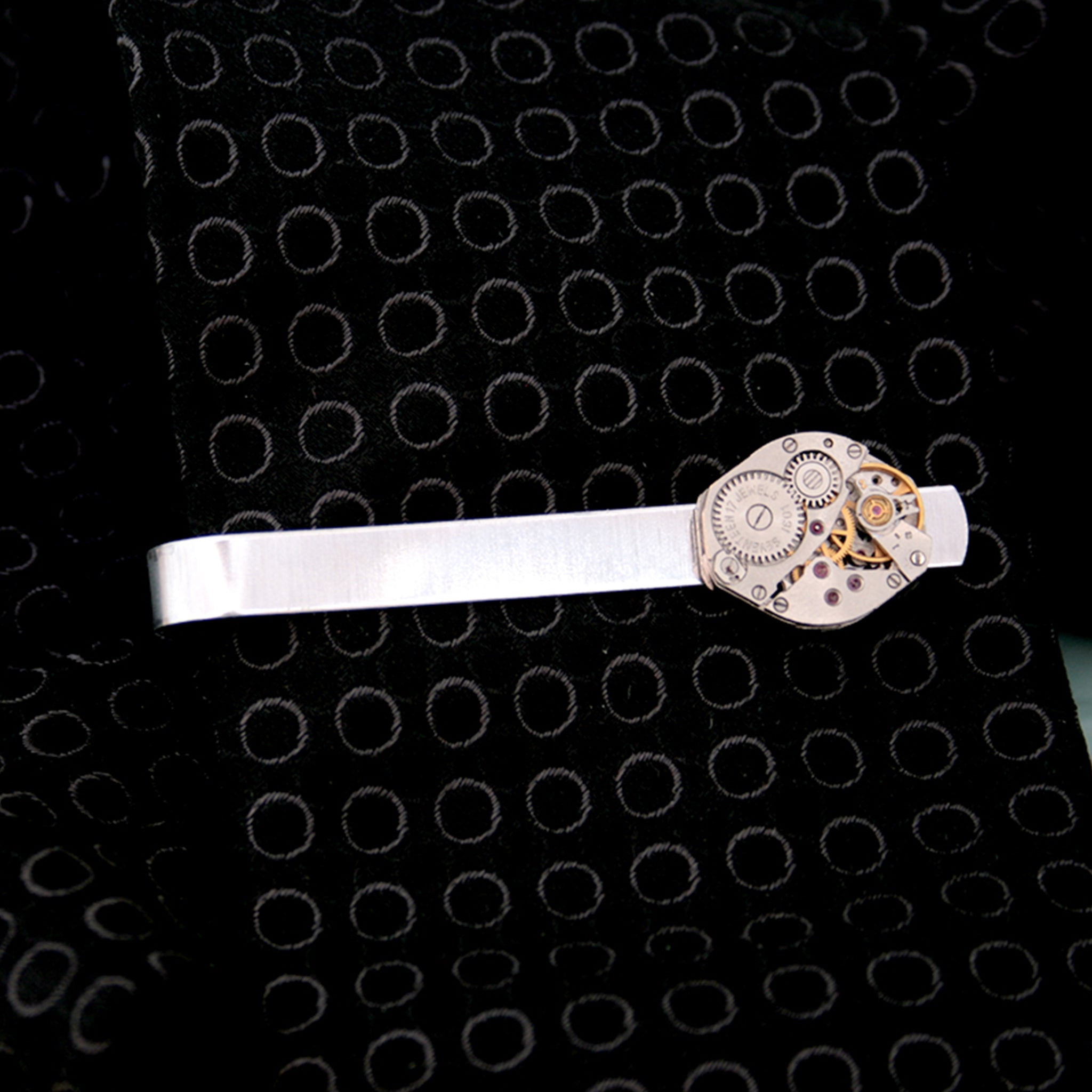 Steam punk tie clip made of real watch on a tie