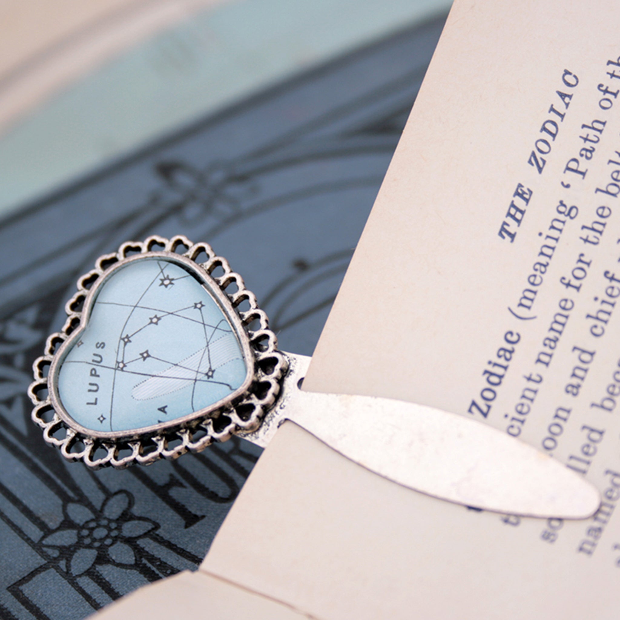 Silver heart metal bookmark featuring Lupus constellation